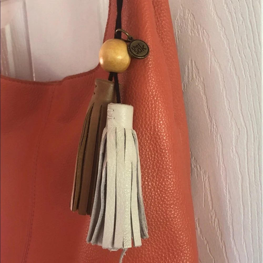 The Sak Huntley Hobo Orange Pebbled Leather Shoulder Bag